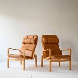 Vintage armchairs with cushions