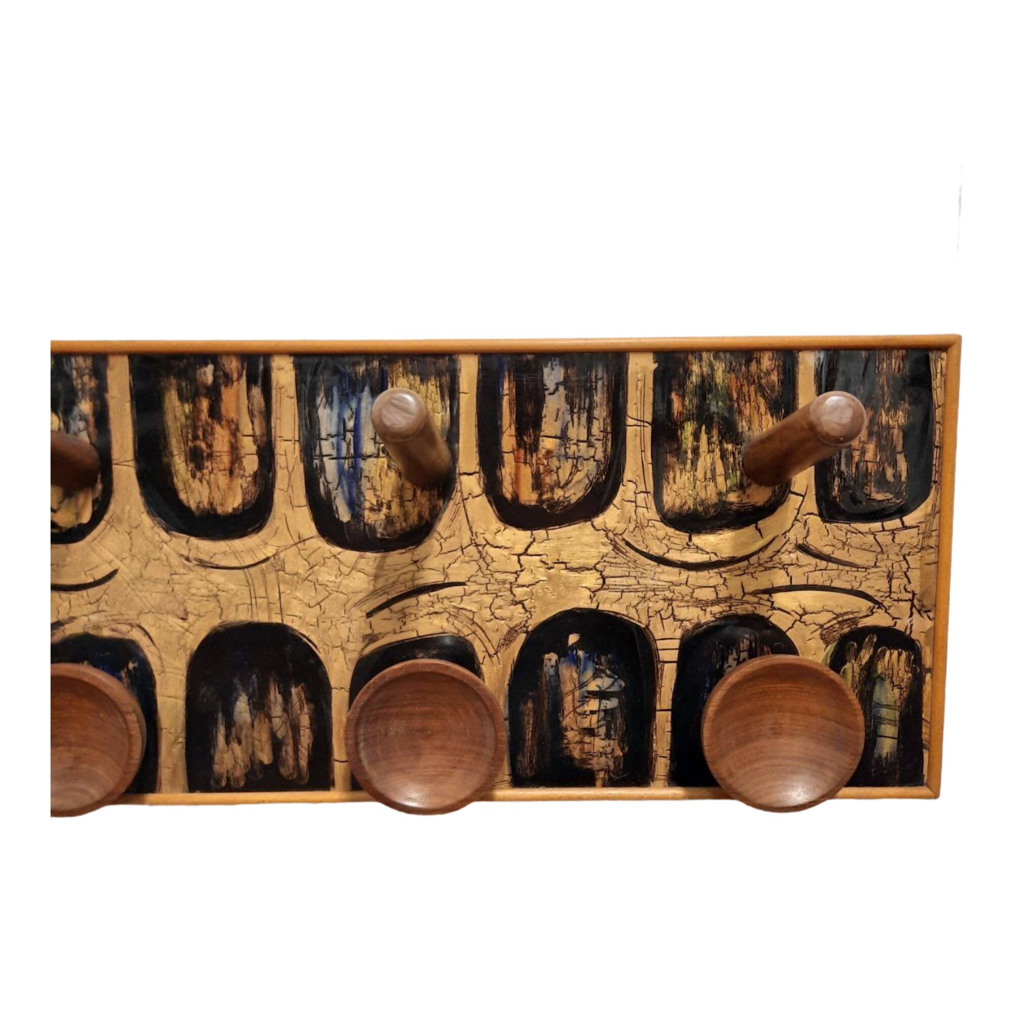 Vintage wooden coat hangers and glazed copper