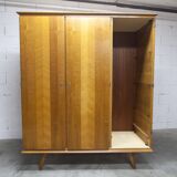 French wardrobe with tapered legs, 3 doors, 1 mirror (27*130), and 1 drawer.