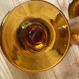 Champagne flutes bubbled amber blown