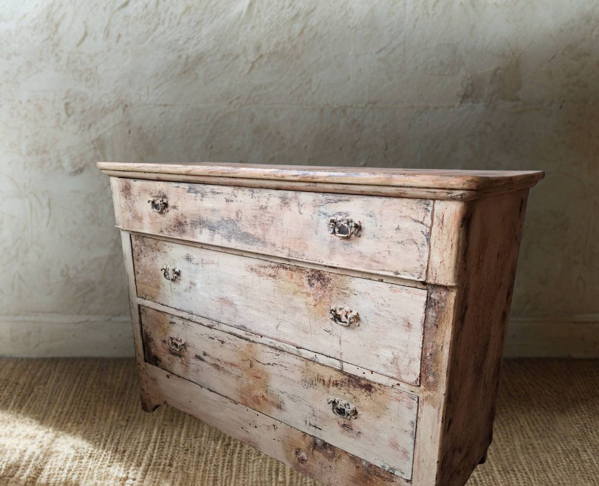 Antique patinated chest of drawers