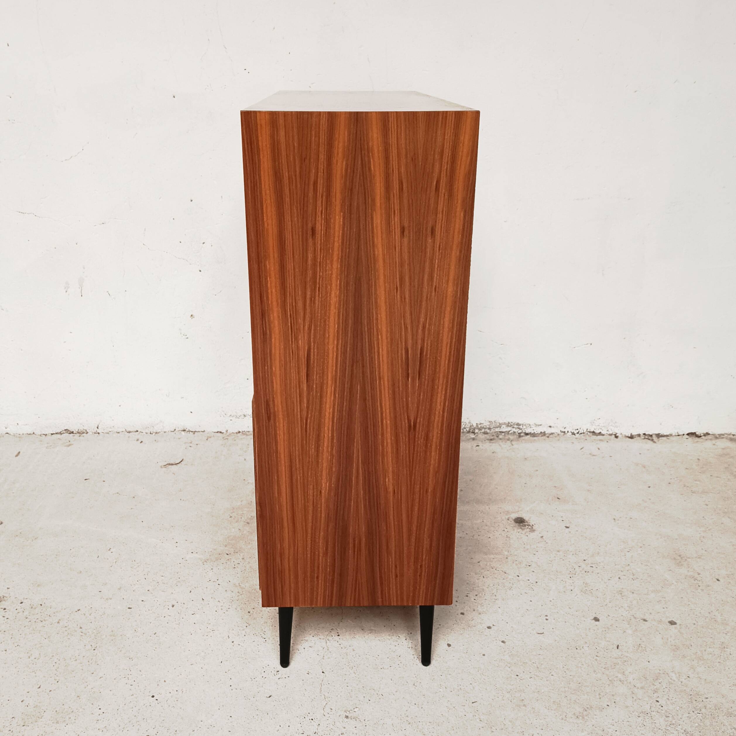 Semi-open, two-door cabinet, 1960