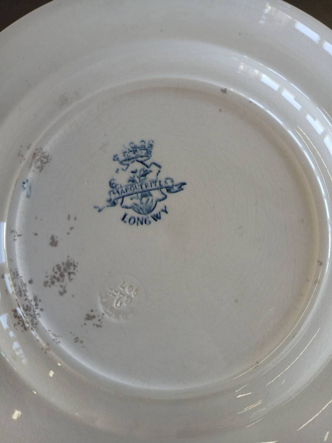 14 mismatched flat plates Terre de fer