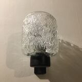 Black metal and molded glass wall sconce