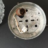 Round ceiling or wall lamp in worked glass. Gray metal support