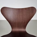 Set of 4 brown oak plywood bar stools by Fritz Hansen Series 7 by Arne Jacobsen.