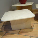 Low tables in travertine