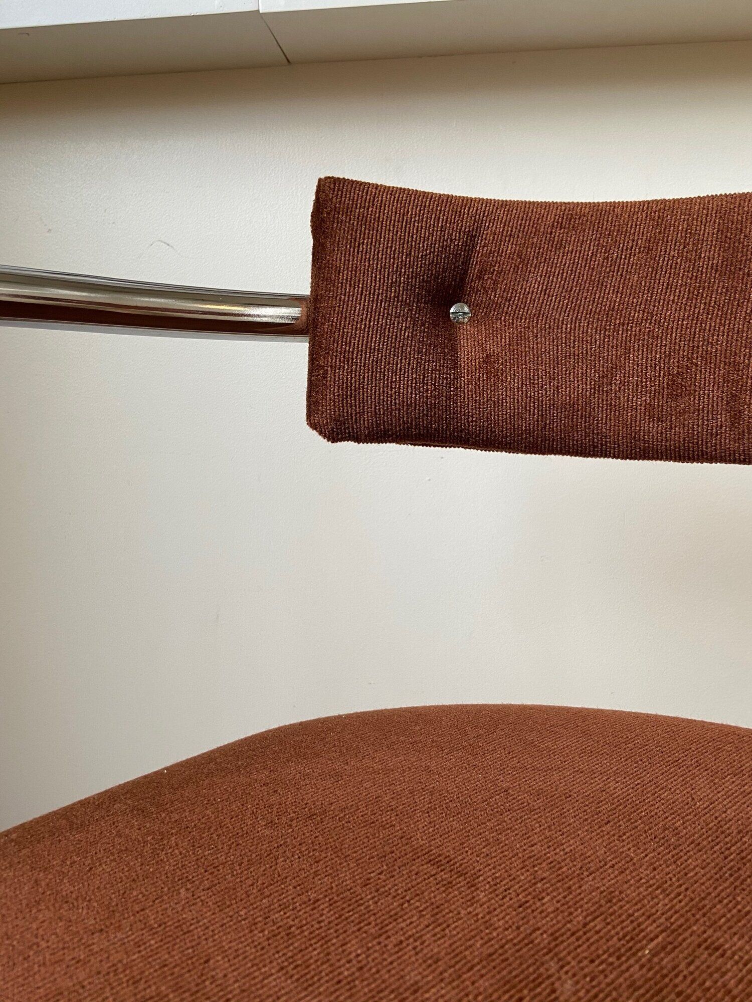 Chrome aluminum chair and brown cotton