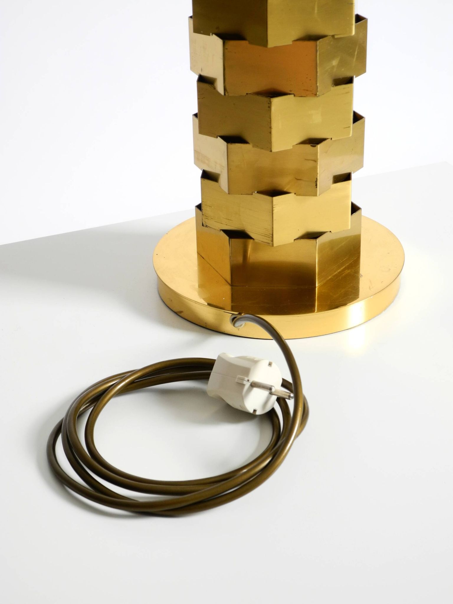 1960s brass table lamp by Vereinigte Werkstätten with an illuminated base