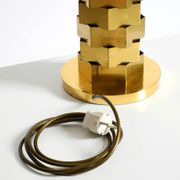 1960s brass table lamp by Vereinigte Werkstätten with an illuminated base