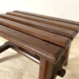 Low stool with wooden slats