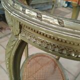 Old oval table with marble top, Louis XVI style