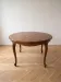 Table de salle à manger ronde extensible style Louis XV en bois