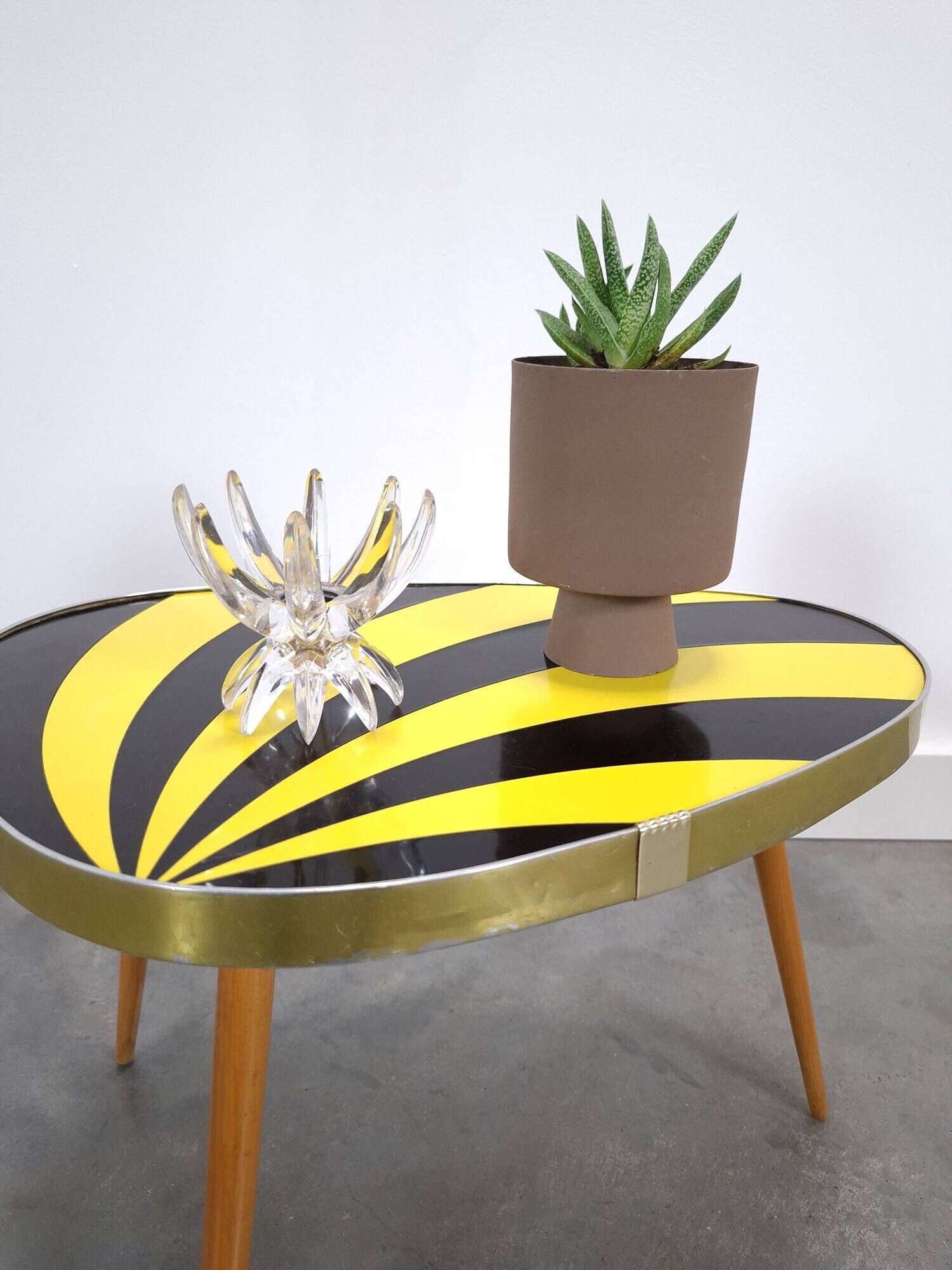 Vintage 1950s black and yellow striped formica table, plant table.