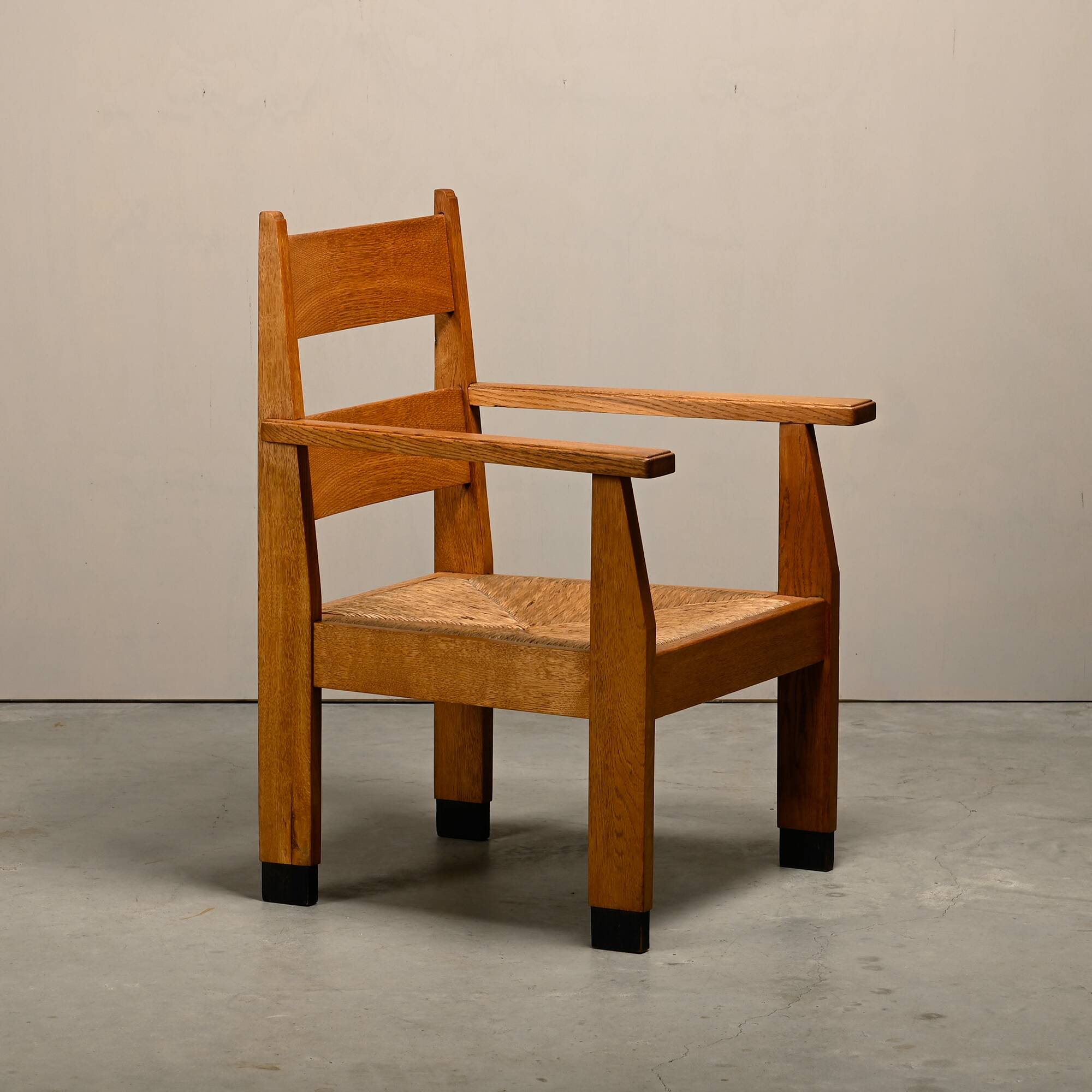 Art Deco Haagse School Armchair in solid Oak and Straw, 1930s