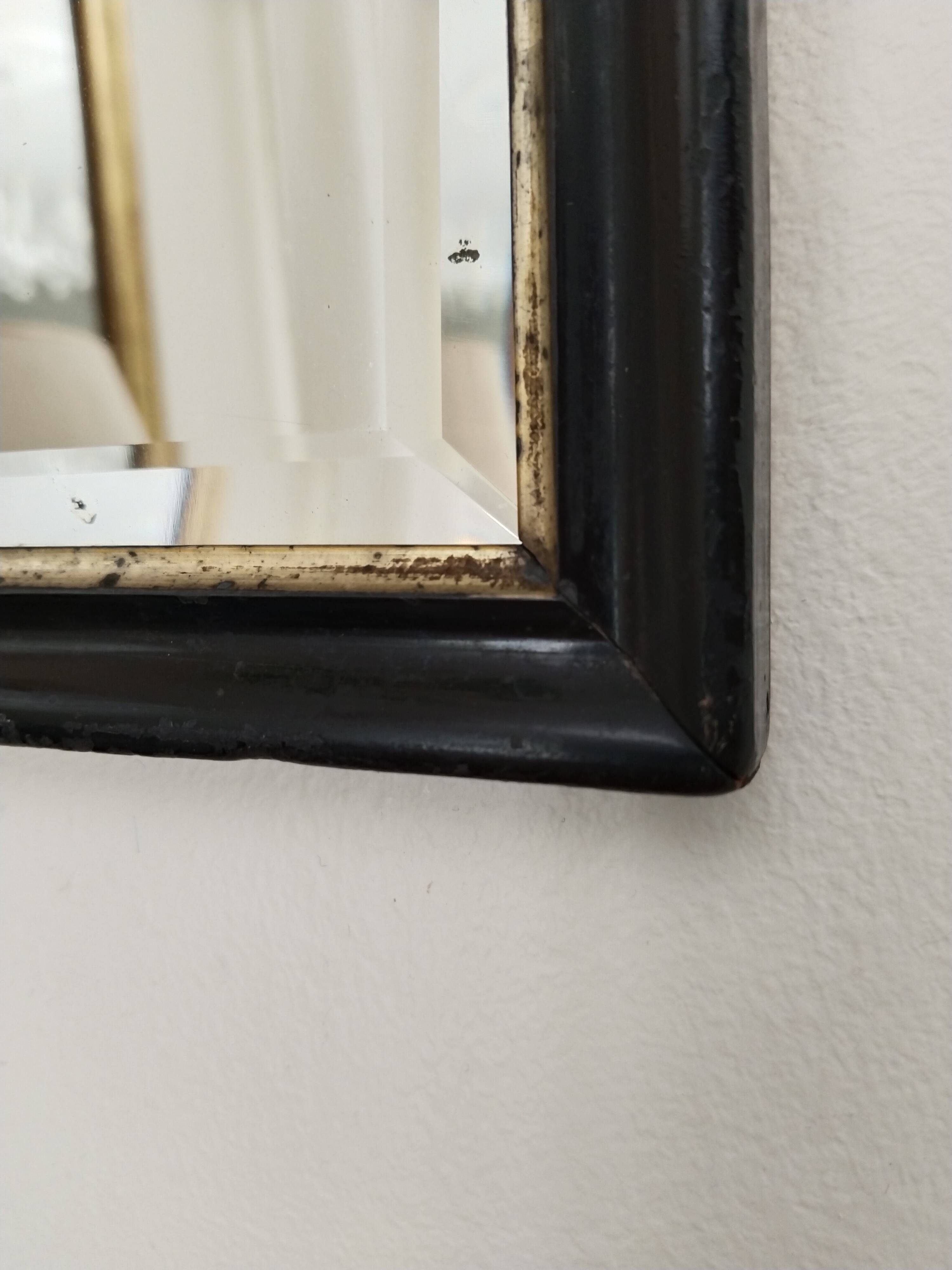Antique Napoleon III beveled mirror, black and gold