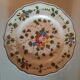4 assiettes et un plat Manufracture Longchamp