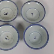 Set of 4 Chinese blue and white bowls with lotus scrolls – 19th century