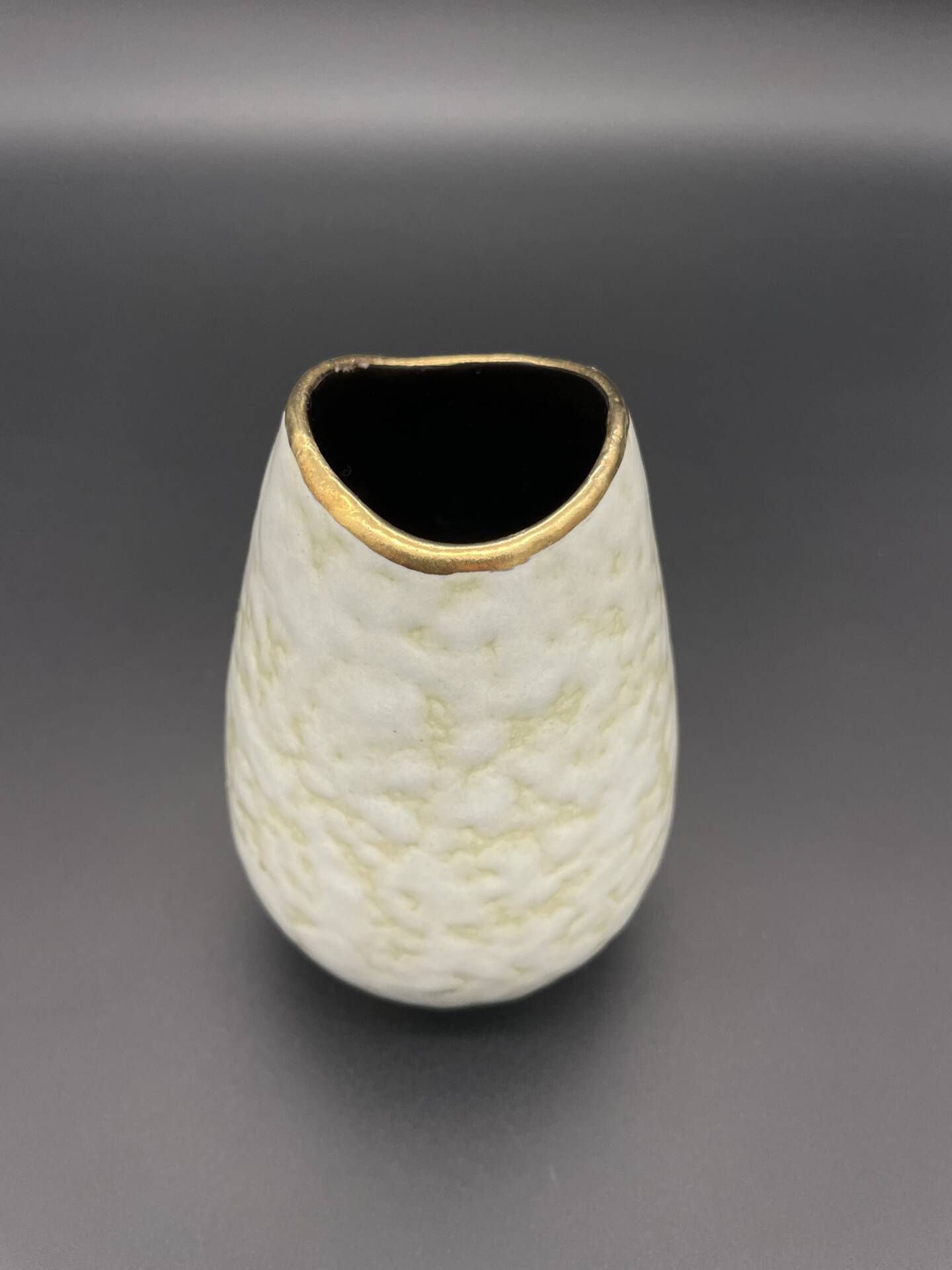 Small Bay Keramik vase with pearlescent glaze and gold trim.