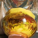 Old provencal pot cover in glazed terracotta