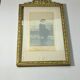 Old photo frame in golden brass floral decoration and small knot 18th With glass
