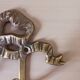 Bronze coat hook