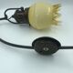 Decorative glass and metal wall light