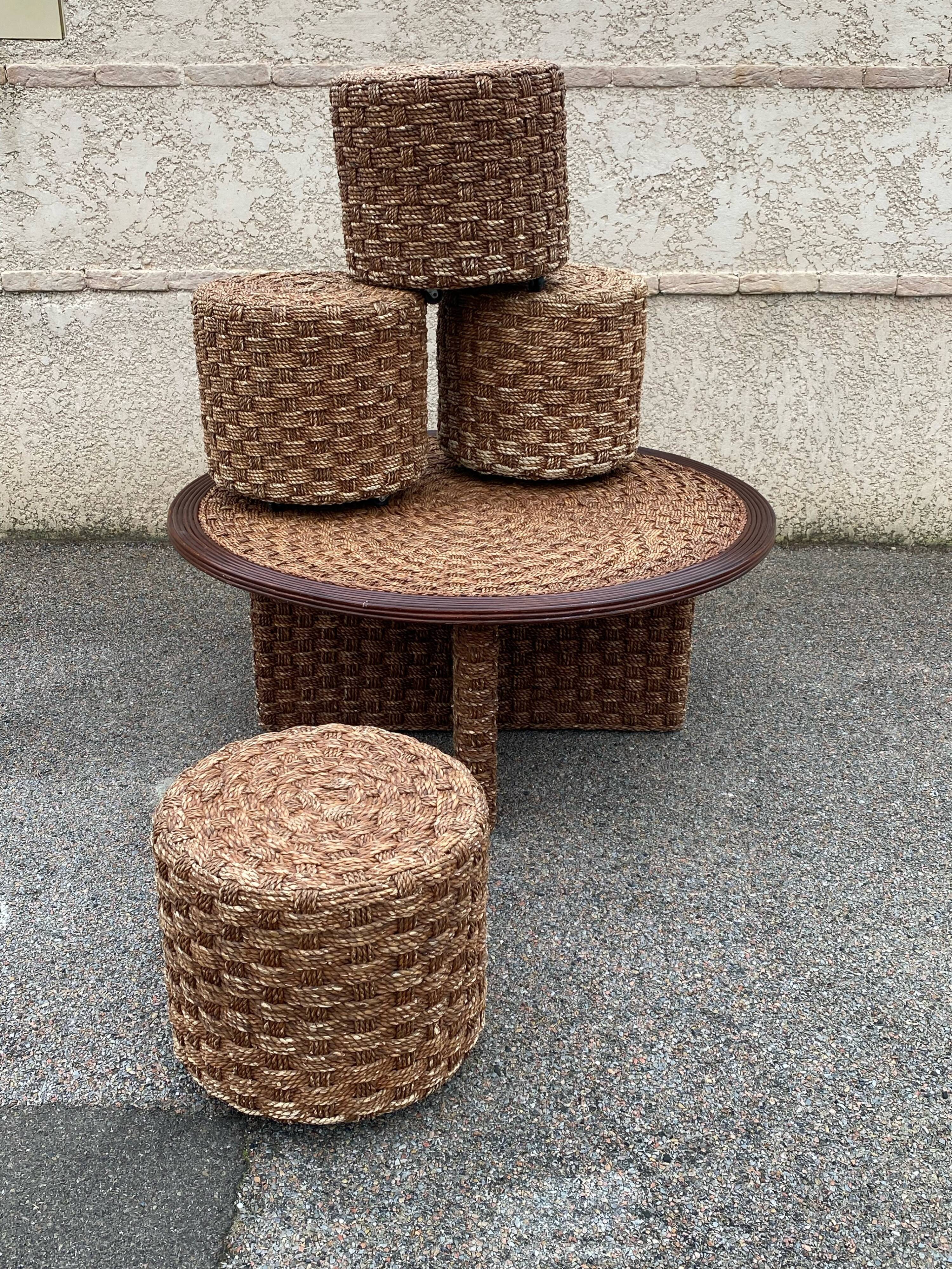 A coffee table and four rope stools 1960/1970
