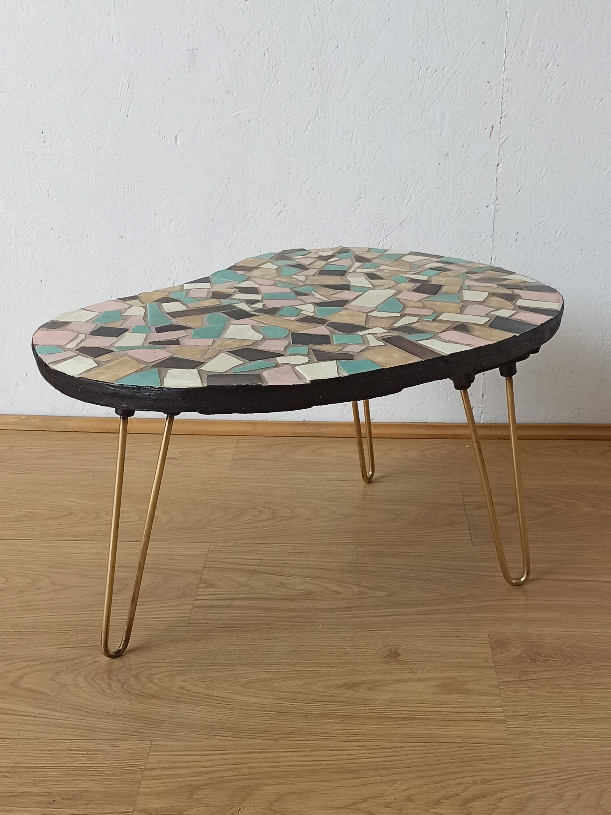 Unusual coffee table on three legs