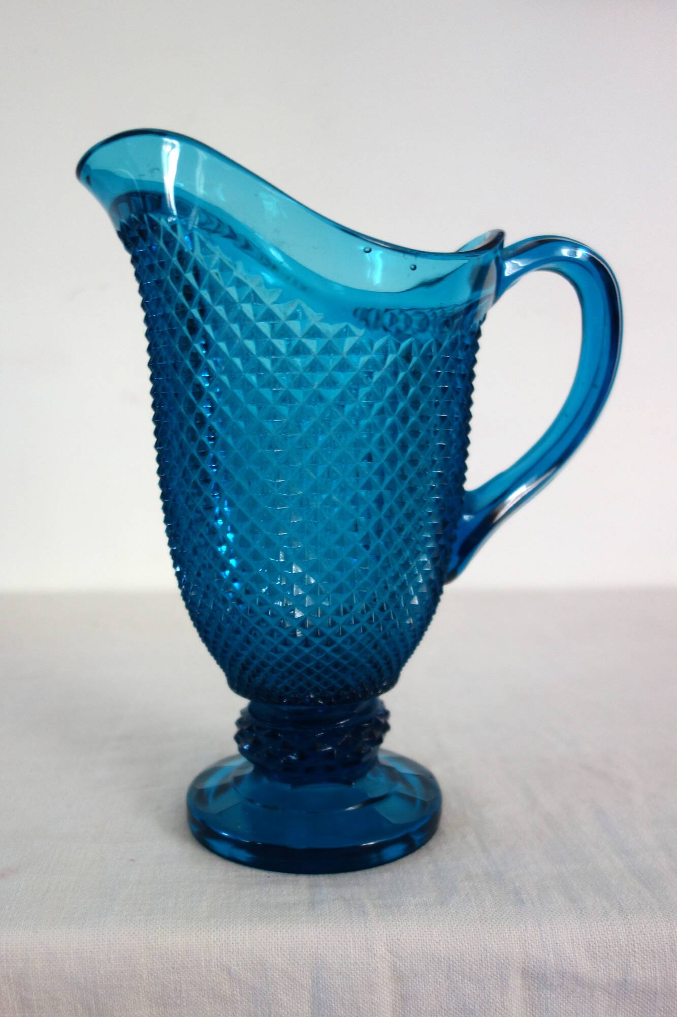 Vintage cut glass blue pitcher