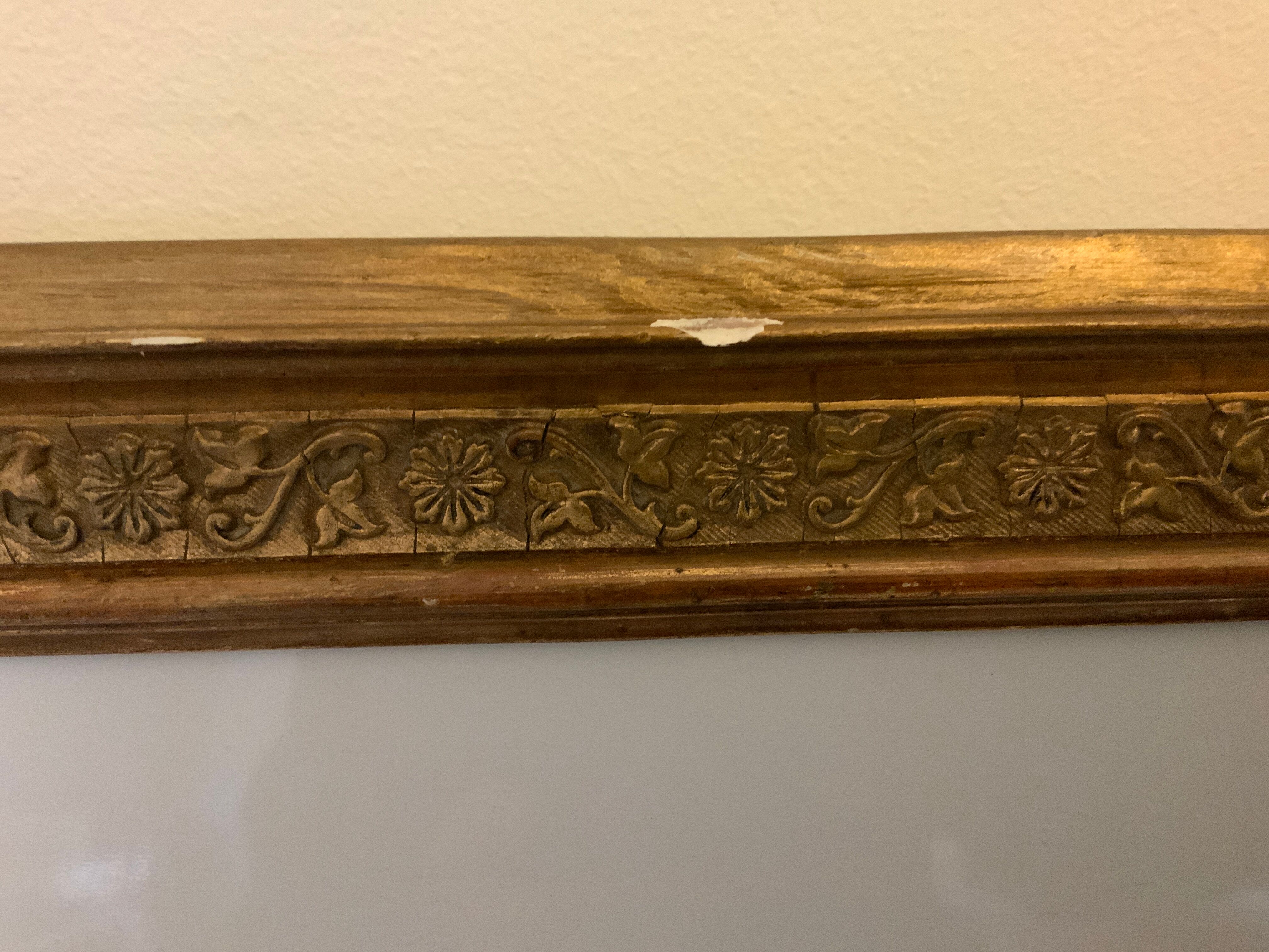 Gilded wood and stucco frame