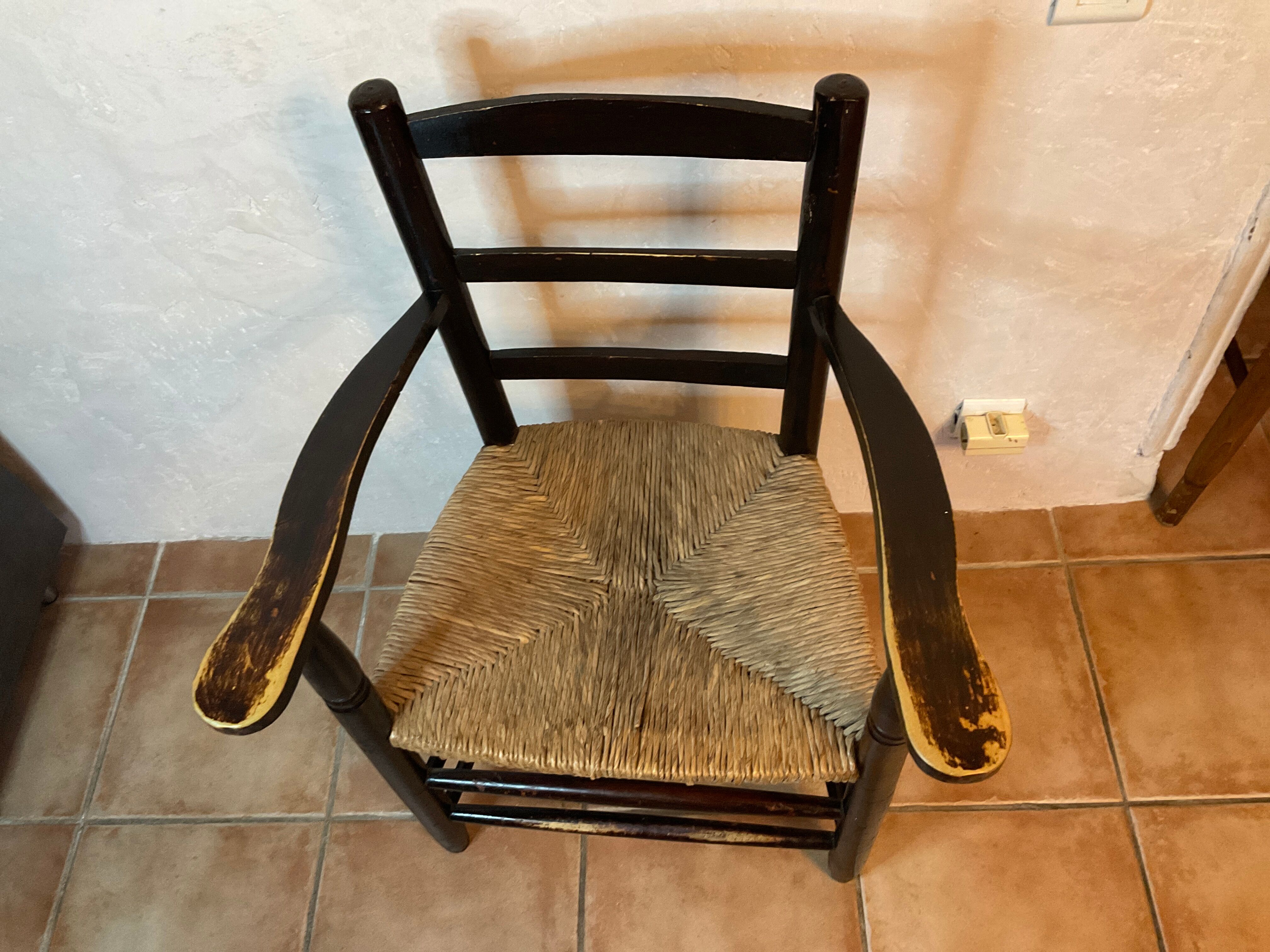 Design armchair of the 20th in straw