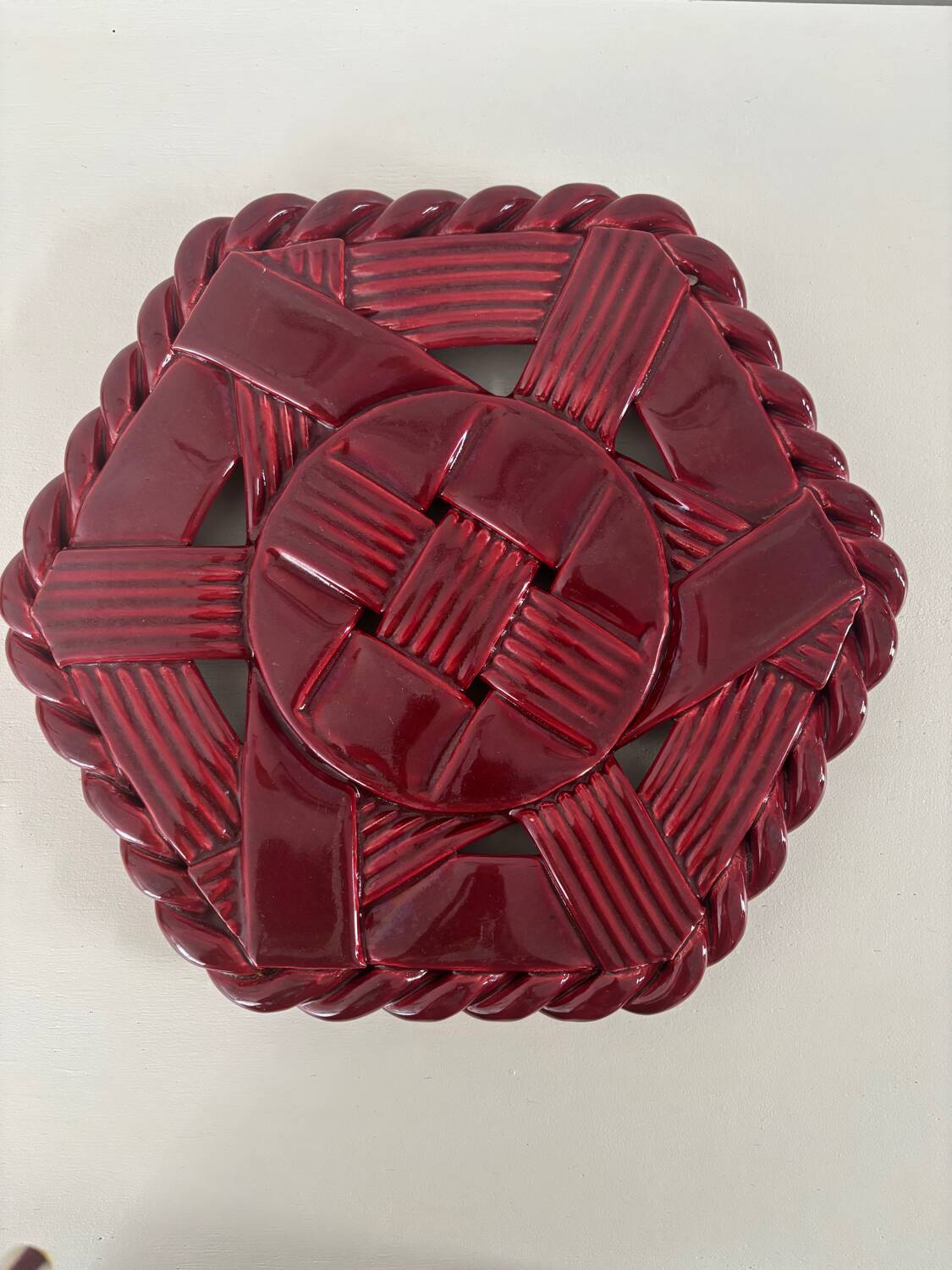Woven ceramic trivet