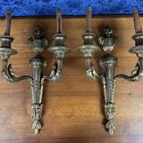 Superb and important pair of LXVI style sconces in gilded bronze
