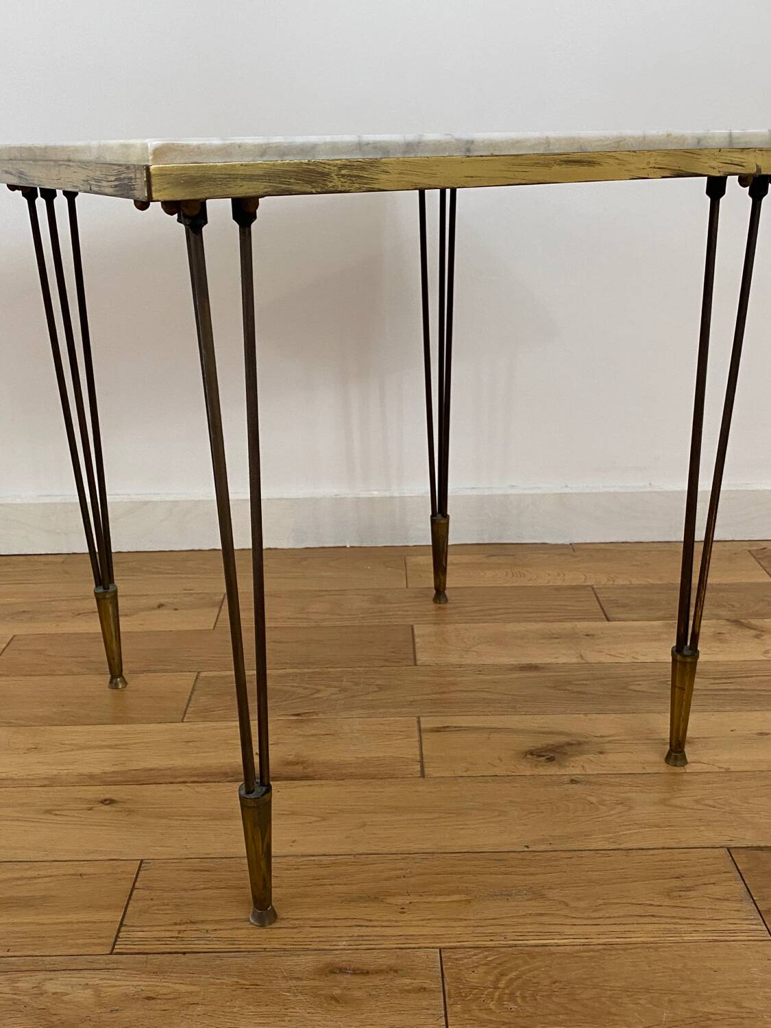 End table in gold metal, white marble top. 60s