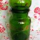 Green glass apothecary flask and golden edars old pot