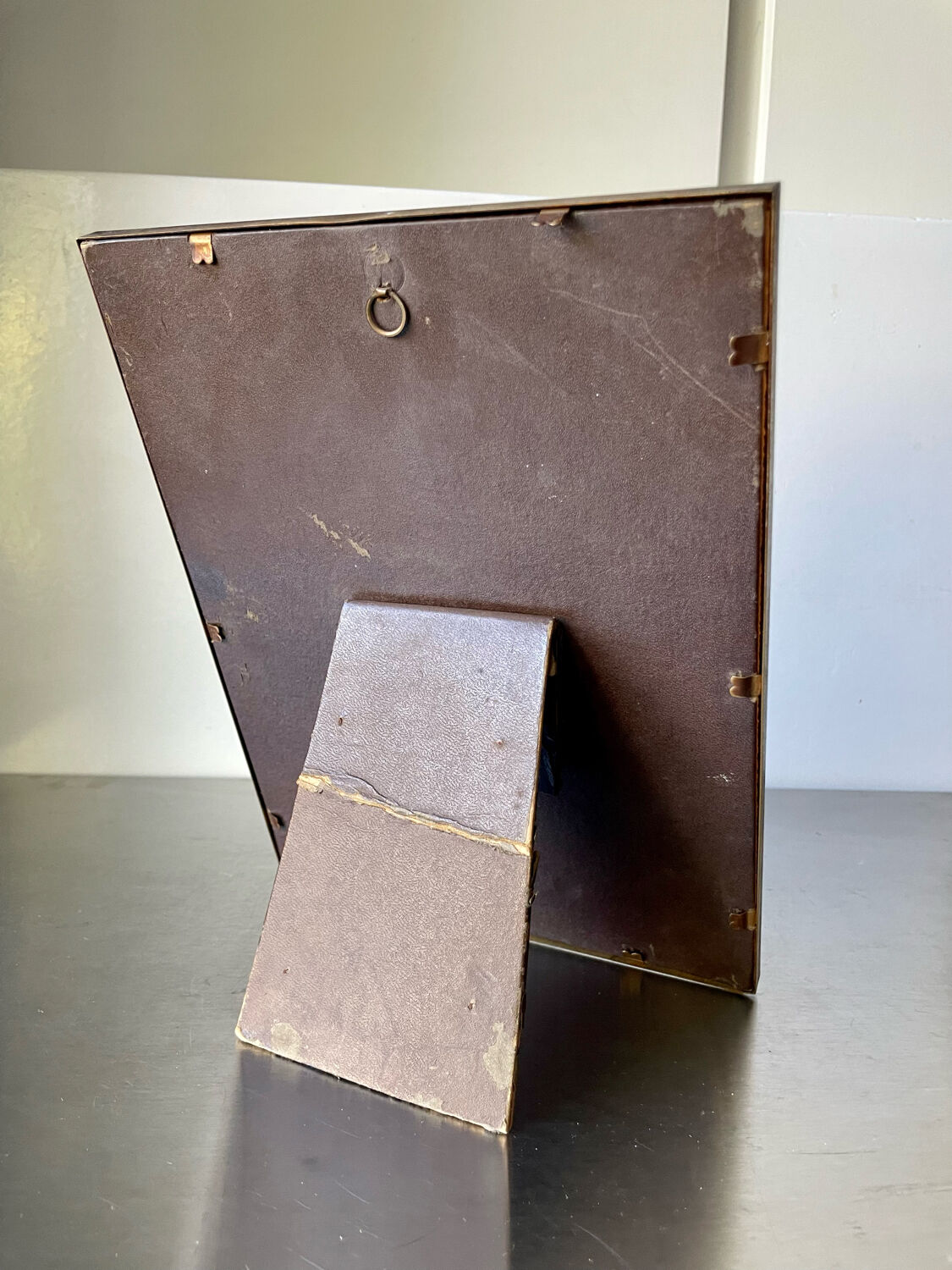 Metal frame in gold colored brass