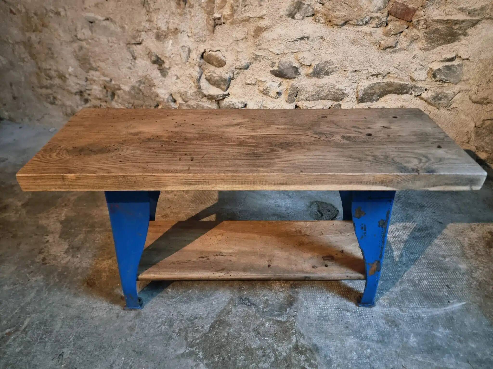 Vintage industrial workbench table with cast iron legs (Aux Forges de Vulcain)