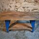 Vintage industrial workbench table with cast iron legs (Aux Forges de Vulcain)