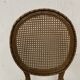 Paire de chaises a médaillons de style Louis XVI en hetre teinté XX siècle