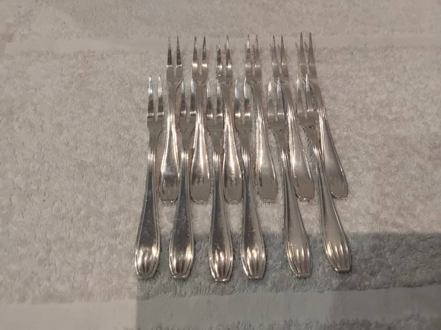 12 silver-plated metal snail forks, SFAM silversmith, Art Deco style
