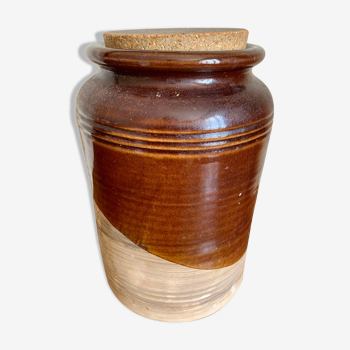 Old sandstone pot with cork lid