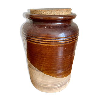 Old sandstone pot with cork lid