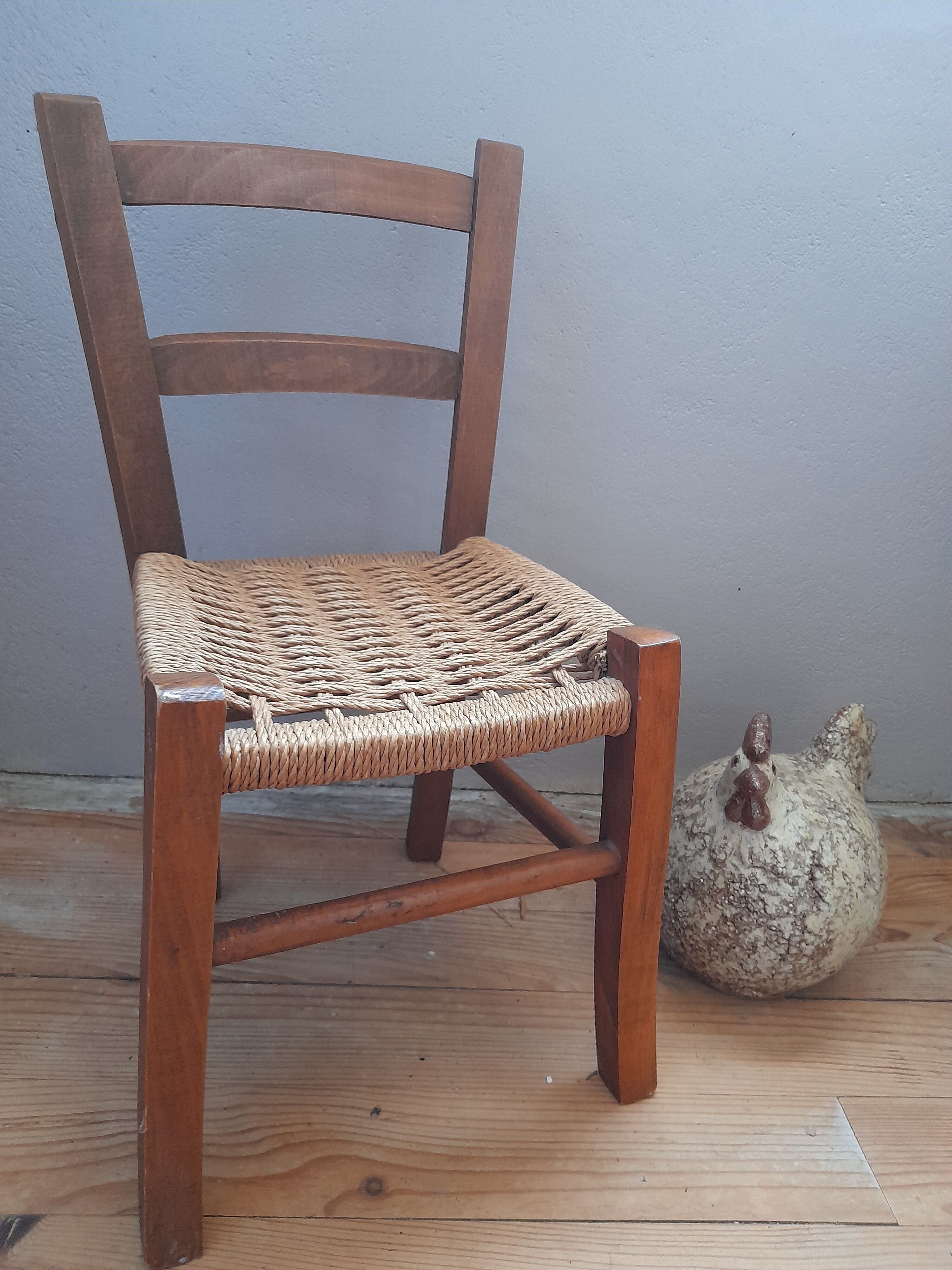 Wooden children's chair, rope seat, circa 1950