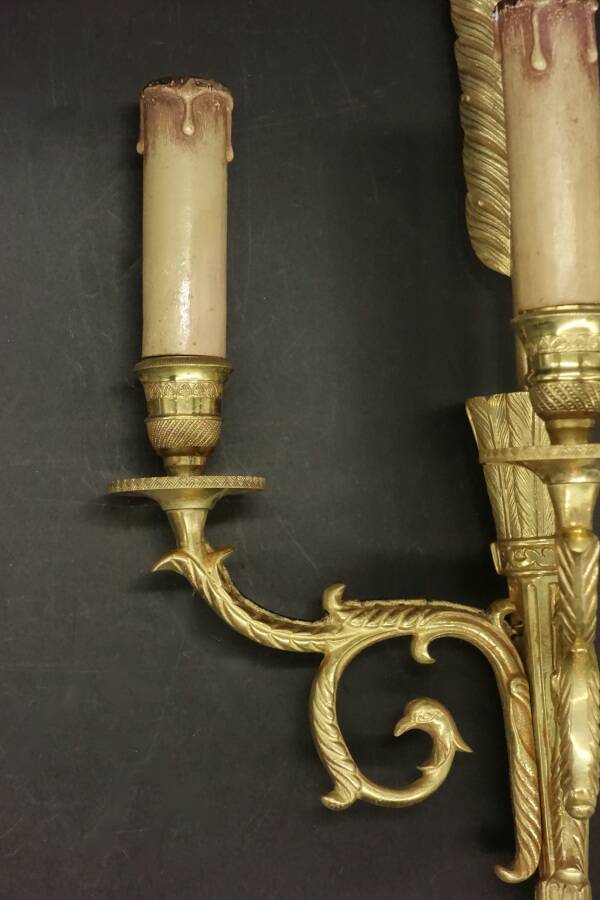 Paire d'appliques en bronze doré flèche et têtes d'aigle style Empire