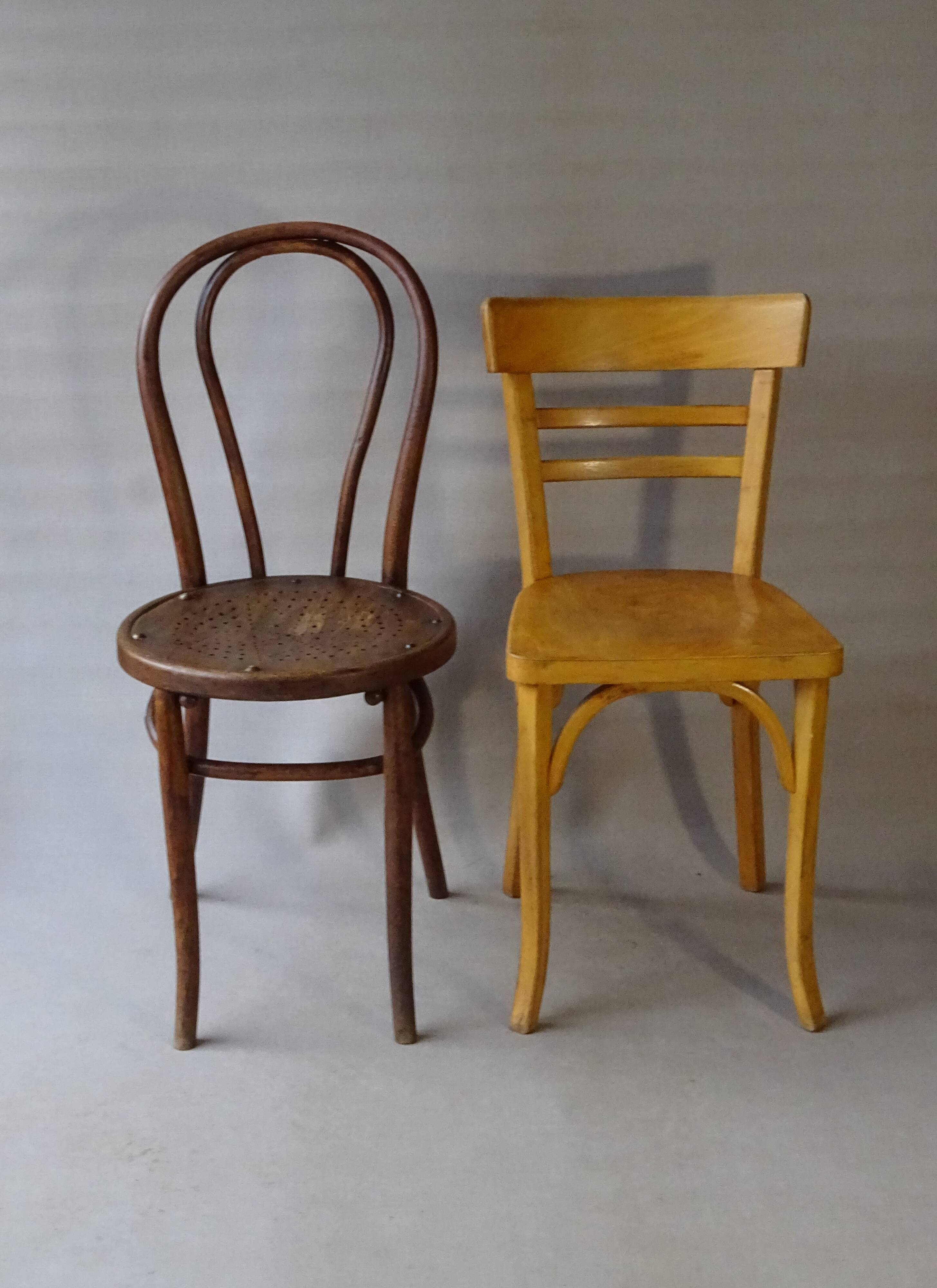Set of 36 mismatched Bistrot chairs, 1920 to 1950, wooden seats.