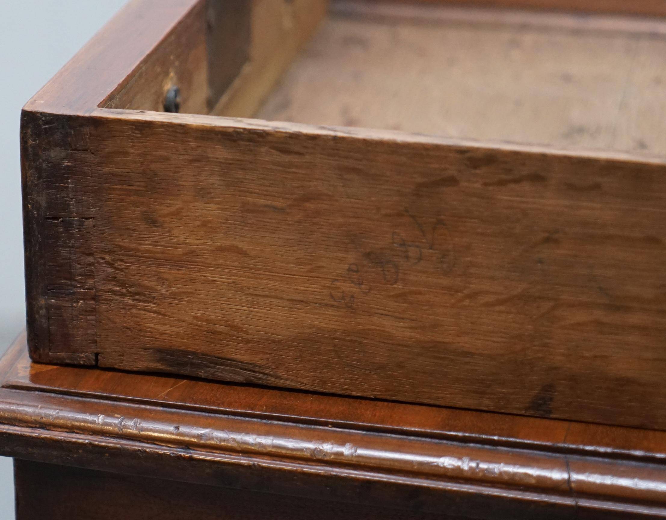 Double-sided partner's desk in walnut, George III, circa 1780, with lion head handles.