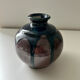 Ink blue round vase and bronze