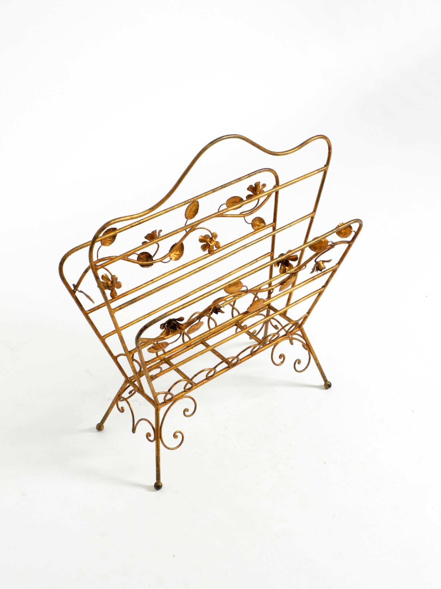 Extraordinary mid-century newspaper and magazine rack with a gilded metal
