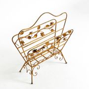 Extraordinary mid-century newspaper and magazine rack with a gilded metal